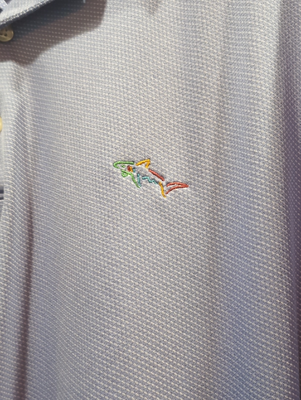 Greg Norman Light Blue Textured Polo with Multicolor Shark Logo